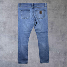 Load image into Gallery viewer, Carhartt WIP "Rebellion Pant" Blue Denim Slim Tapered Fit Jeans