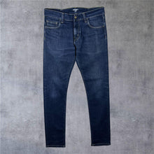 Load image into Gallery viewer, Carhartt WIP "Rebel Pant" Dark Blue Denim Slim Tapered Fit Jeans