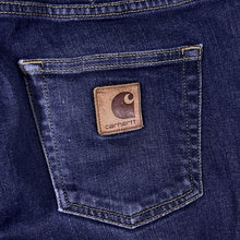 Load image into Gallery viewer, Carhartt WIP "Rebel Pant" Dark Blue Denim Slim Tapered Fit Jeans