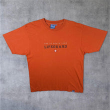 Load image into Gallery viewer, Early 00's Tog 24 Beach Club "Lifeguard" Surfer Graphic Orange Cotton T-Shirt