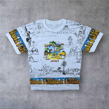 Load image into Gallery viewer, Early 00’s Tunisia “Hello Tunisia” Souvenir Cartoon All-Over Print Graphic T-Shirt

