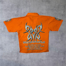 Load image into Gallery viewer, Early 00's Dognose "Brainstorm" Goth Y2K Tribal Orange Polyester Shirt
