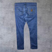Load image into Gallery viewer, Carhartt WIP "Rebellion Pant" Classic Blue Denim Slim Tapered Fit Jeans
