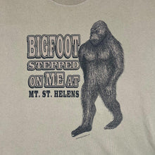 Load image into Gallery viewer, Early 00&#39;s Bigfoot Stepped On Me At Mt. St. Helens Souvenir Graphic Brown T-Shirt
