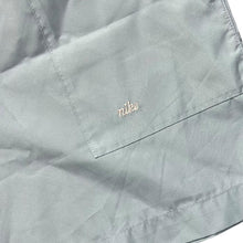 Load image into Gallery viewer, Vintage 90&#39;s NIKE Embroidered Mini Logo Pale Grey Blue Polyester Shorts
