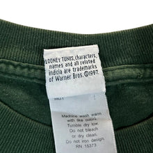 Load image into Gallery viewer, Vintage LOONEY TUNES (1997) &quot;Holding?!!&quot; Taz Football All-Over Print Green T-Shirt
