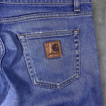 Load image into Gallery viewer, Carhartt WIP "Rebellion Pant" Classic Blue Denim Slim Tapered Fit Jeans
