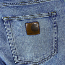 Load image into Gallery viewer, Carhartt WIP "Rebellion Pant" Blue Denim Slim Tapered Fit Jeans
