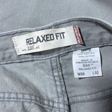 Load image into Gallery viewer, Vintage Levi&#39;s 550 Relaxed Fit Tapered Leg Light Grey Cotton Denim Jeans
