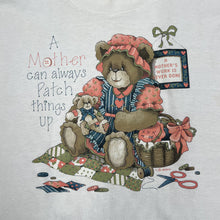 Load image into Gallery viewer, Screen Stars A MOTHER CAN ALWAYS PATCH THINGS UP Single Stitch T-Shirt
